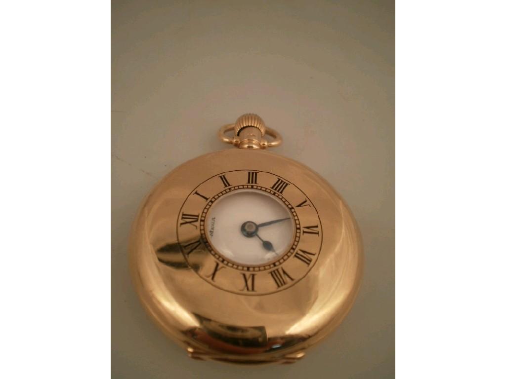 Appraisal: A George V Omega ct gold Dennison cased half Hunter