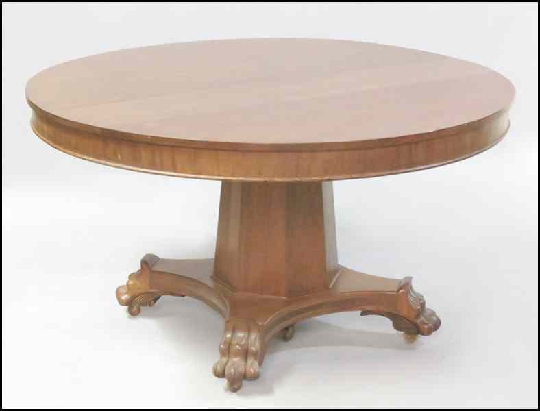 Appraisal: MAHOGANY SINGLE PEDESTAL DINING TABLE With paw feet and four