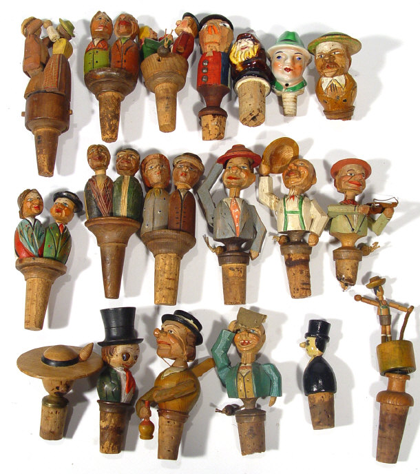 Appraisal: Collection of ceramic and wooden novelty bottle pourers some with