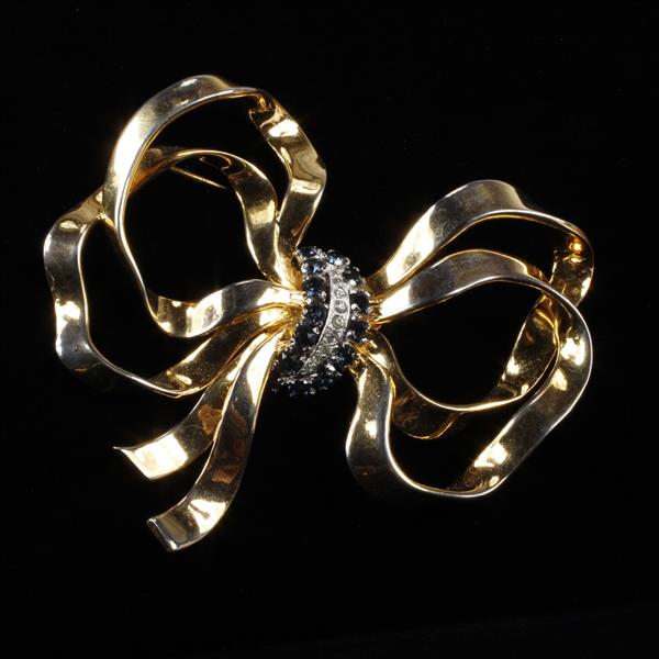 Appraisal: Large Gold Tone Bow with Sapphire Blue Clear Rhinestones Loss