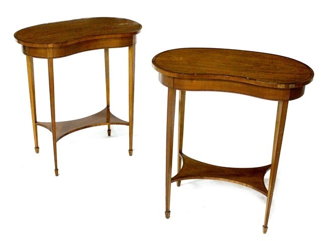 Appraisal: A pair of late th century satinwood kidney shaped occasional