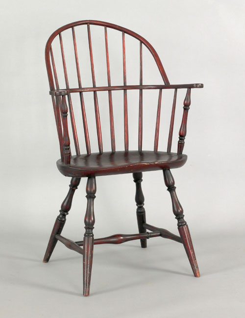 Appraisal: New England sackback Windsor armchair ca retaining an old varnished