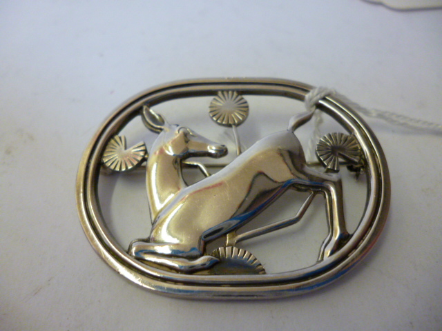 Appraisal: A GEORG JENSEN SILVER BROOCH of open oblong form cast