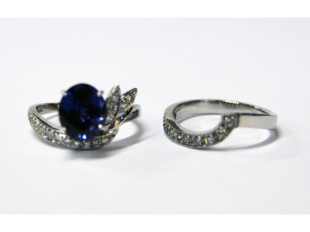 Appraisal: Tanzanite approx cts and diamond ring in the form of