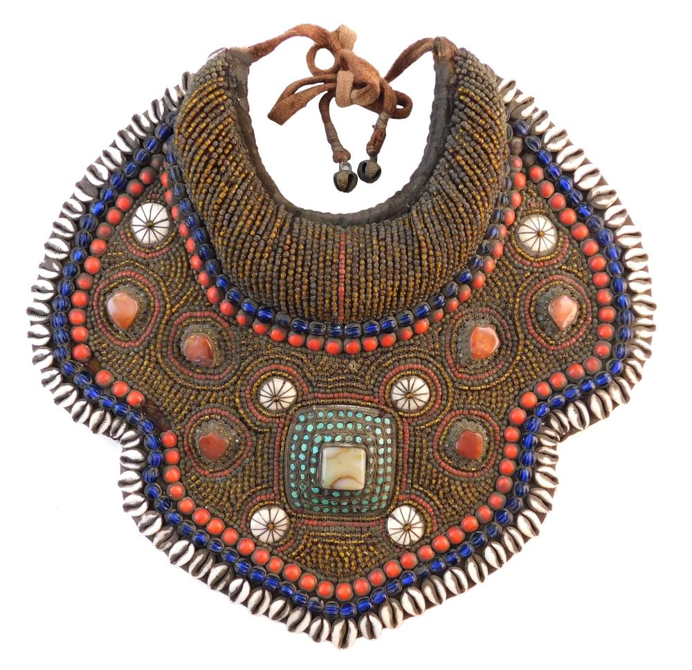 Appraisal: Tibetan ceremonial collar with a trim of cowrie shells glass