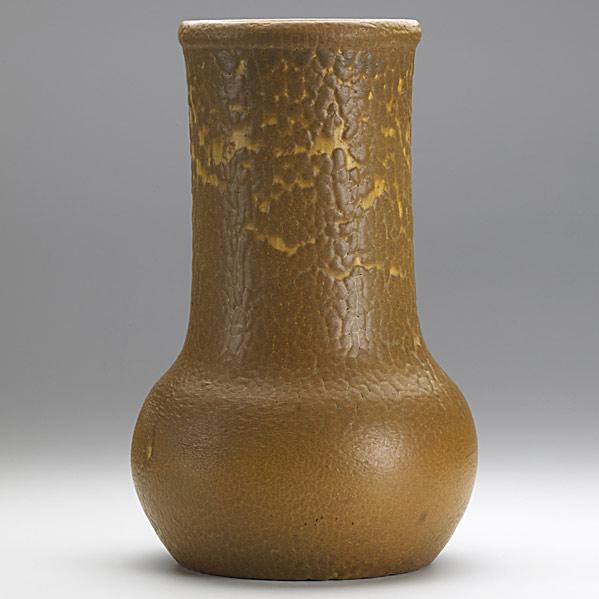 Appraisal: GRUEBYTall vase in curdled and rippled matte brown glazeGrueby Pottery