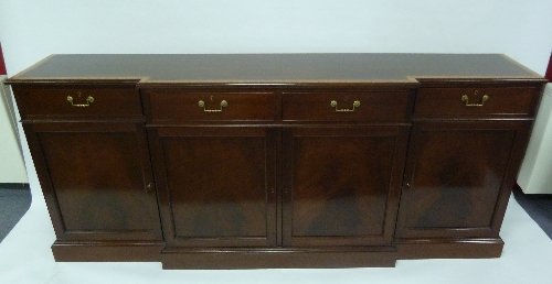 Appraisal: A Georgian III style breakfront cabinet th Century the cross