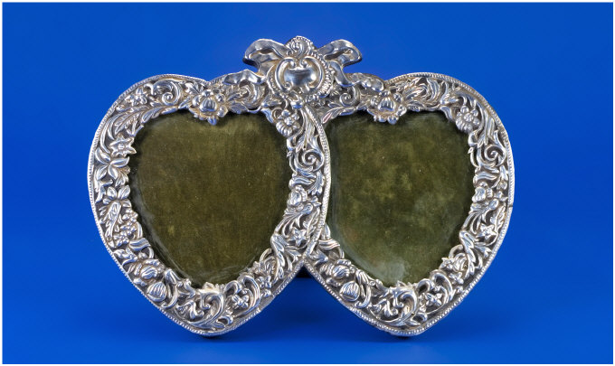 Appraisal: Twin Heart Shaped Silver Photo Frame Stamped Sterling Silver Measures