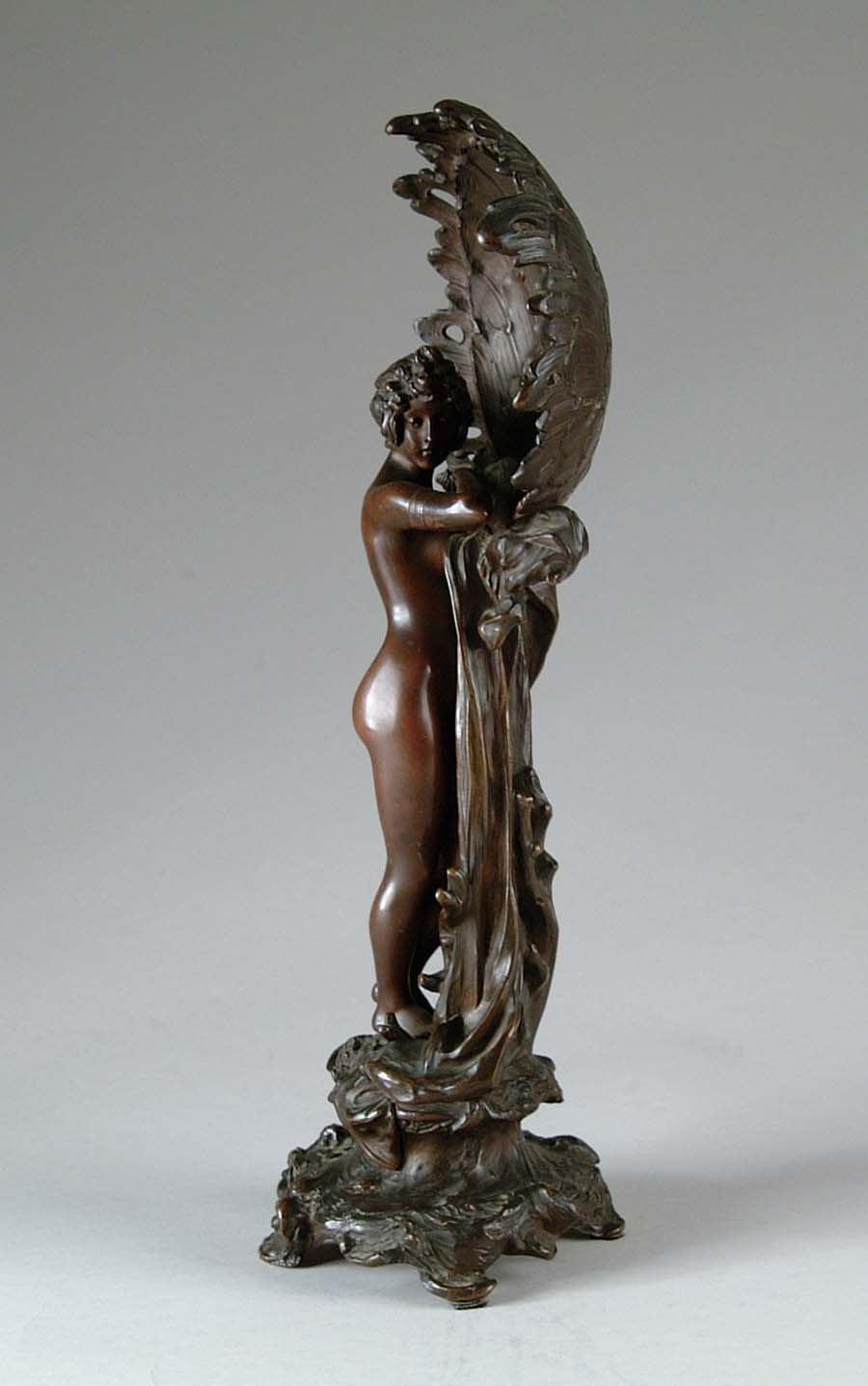 Appraisal: BRONZE SCULPTURE Beautiful bronze sculpture depicts nude woman standing beside