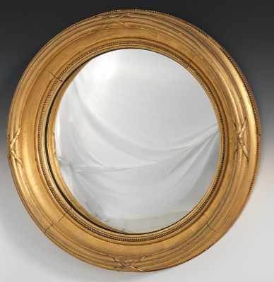 Appraisal: A Federal Style Bullseye Mirror The circular carved and molded