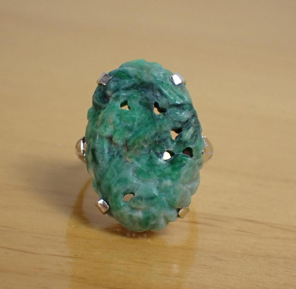 Appraisal: GREEN HARDSTONE AND WHITE GOLD FILIGREE RING The k white