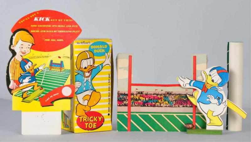 Appraisal: Walt Disney Donald Duck Football Player Toy Description Cardboard and