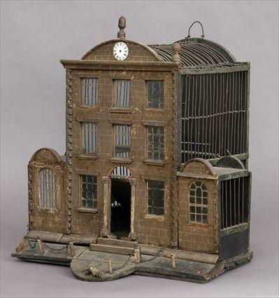 Appraisal: GEORGIAN PAINTED WOOD GLASS AND METAL HOUSE-FORM BIRDCAGE The faux