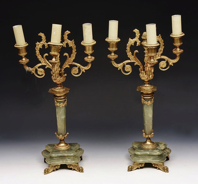 Appraisal: A PAIR OF GREEN ONYX AND GILT METAL THREE BRANCH