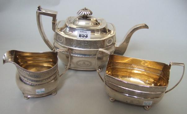 Appraisal: A silver composite three piece tea set the teapot decorated