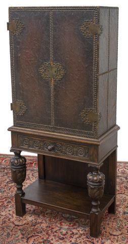 Appraisal: Spanish Renaissance Revival oak cabinet on stand late th c