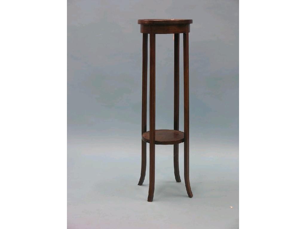 Appraisal: An Edwardian inlaid mahogany plant stand circular-shape with undertier in