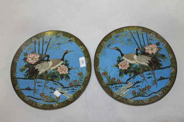 Appraisal: A PAIR OF JAPANESE BLUE CLOISONNE CHARGERS each decorated with