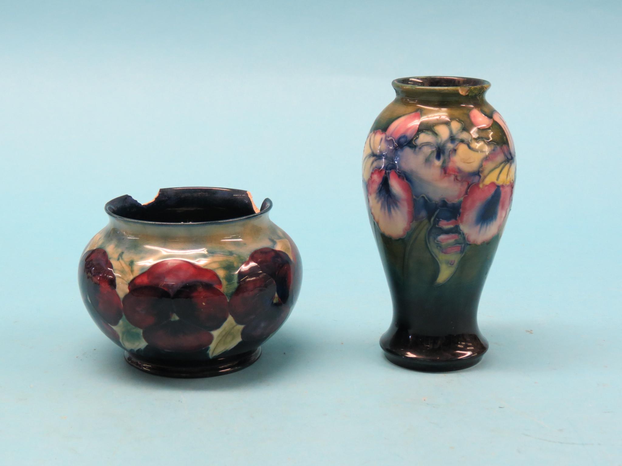 Appraisal: Two damaged Moorcroft vases one squat circular Pansy the other