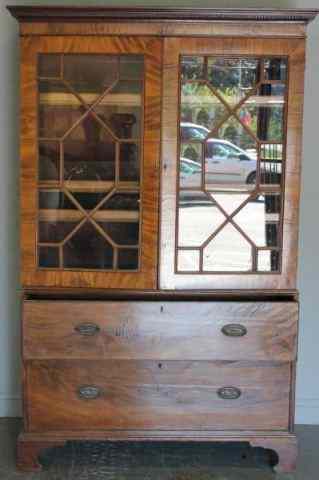 Appraisal: Georgian Mahogany Bookcase Two door over two drawer raised on