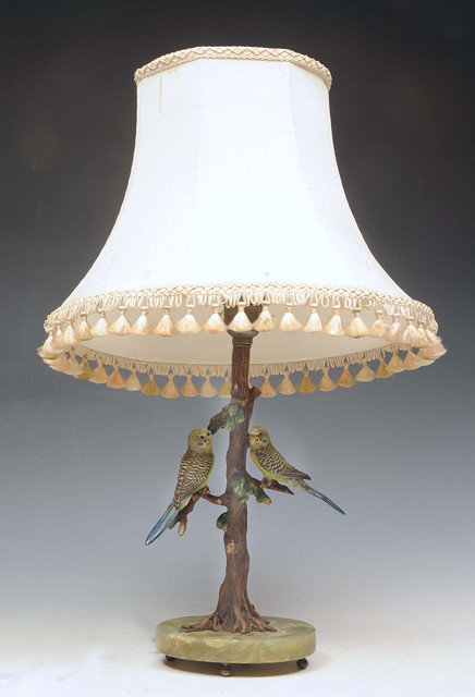 Appraisal: A TABLE LAMP in the form of two cold cast