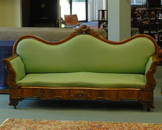 Appraisal: A th C Rococo Revival Sofa the mahogany frame having