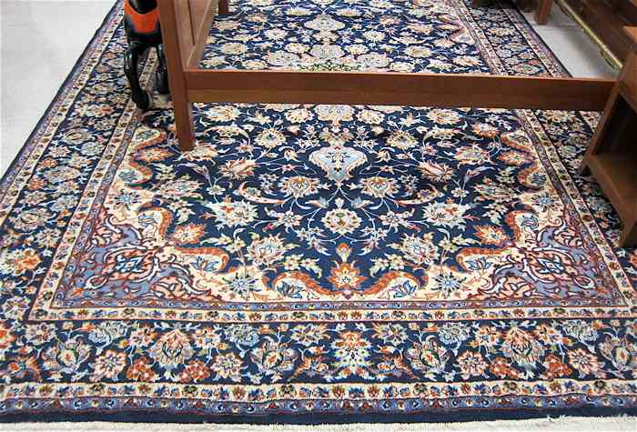 Appraisal: PERSIAN KASHAN CARPET floral and central floral medallion design on