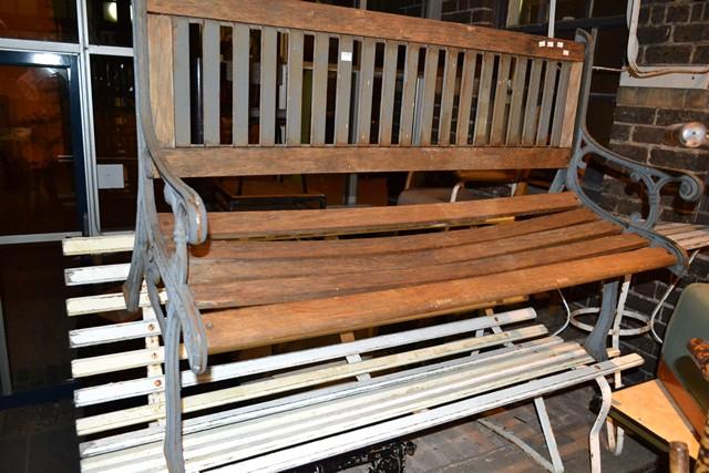 Appraisal: A TIMBER BENCH SEAT WITH CAST IRON SIDES A TIMBER