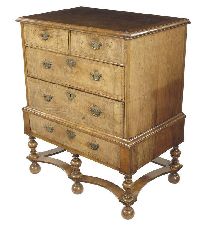 Appraisal: A walnut small chest on stand