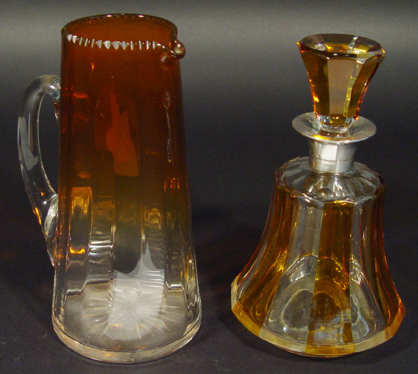 Appraisal: Amber flashed cut glass decanter and stopper with silver collar