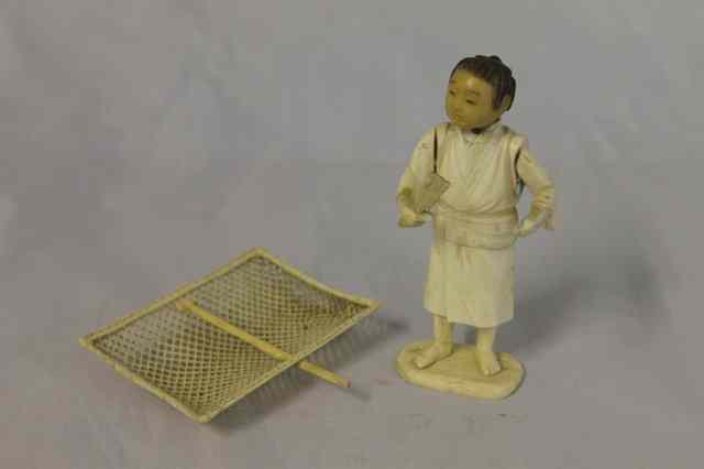 Appraisal: A JAPANESE CARVED IVORY MODEL OF A FISHERMAN for restoration