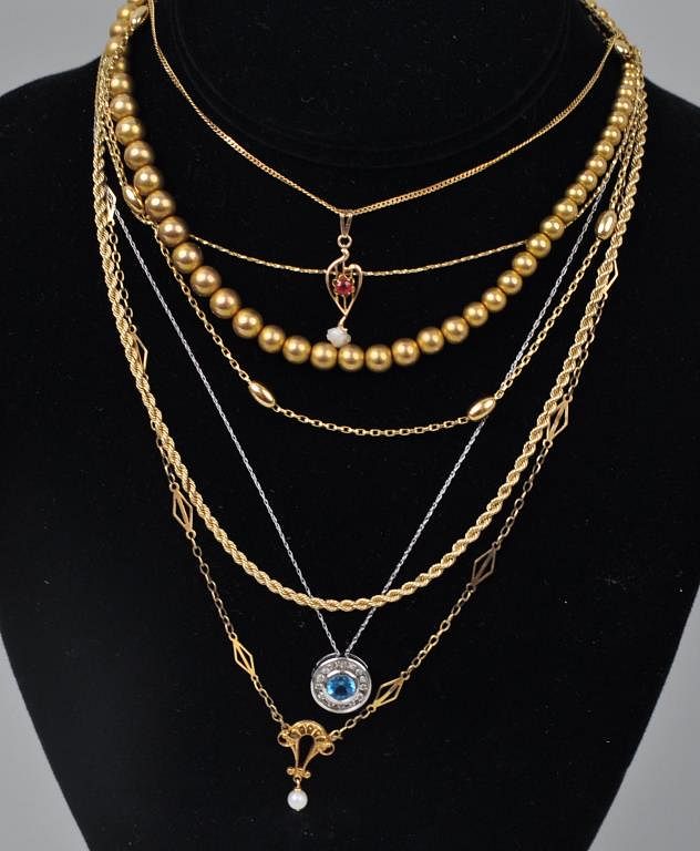 Appraisal: Six K Gold Necklaces One K Gold Necklace longest chain