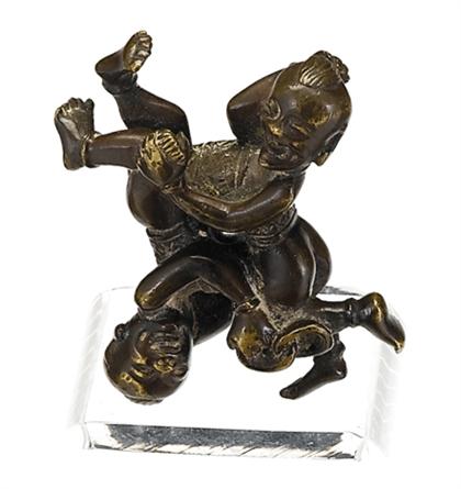 Appraisal: Chinese 'double boy' bronze brush rest th century Cast to