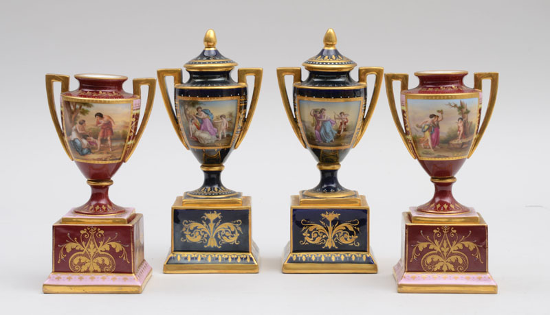 Appraisal: PAIR OF VIENNA PORCELAIN HAND-COLORED SMALL URNS AND COVERS AND