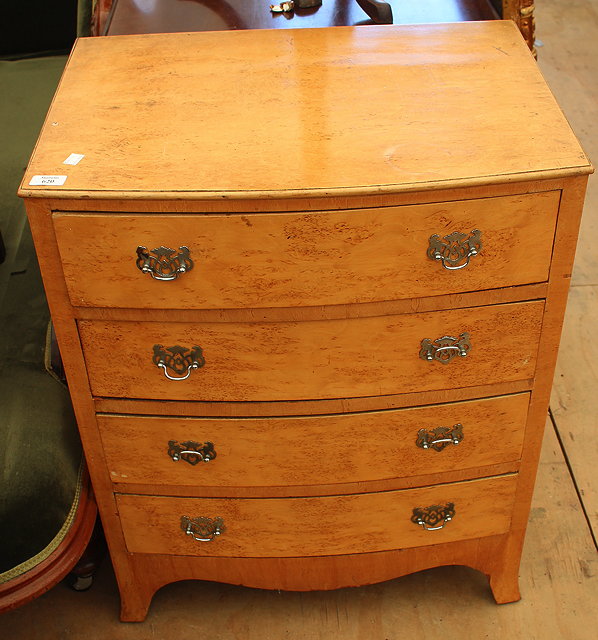 Appraisal: A SMALL MAPLE WOOD VENEERED BOW FRONTED CHEST of four