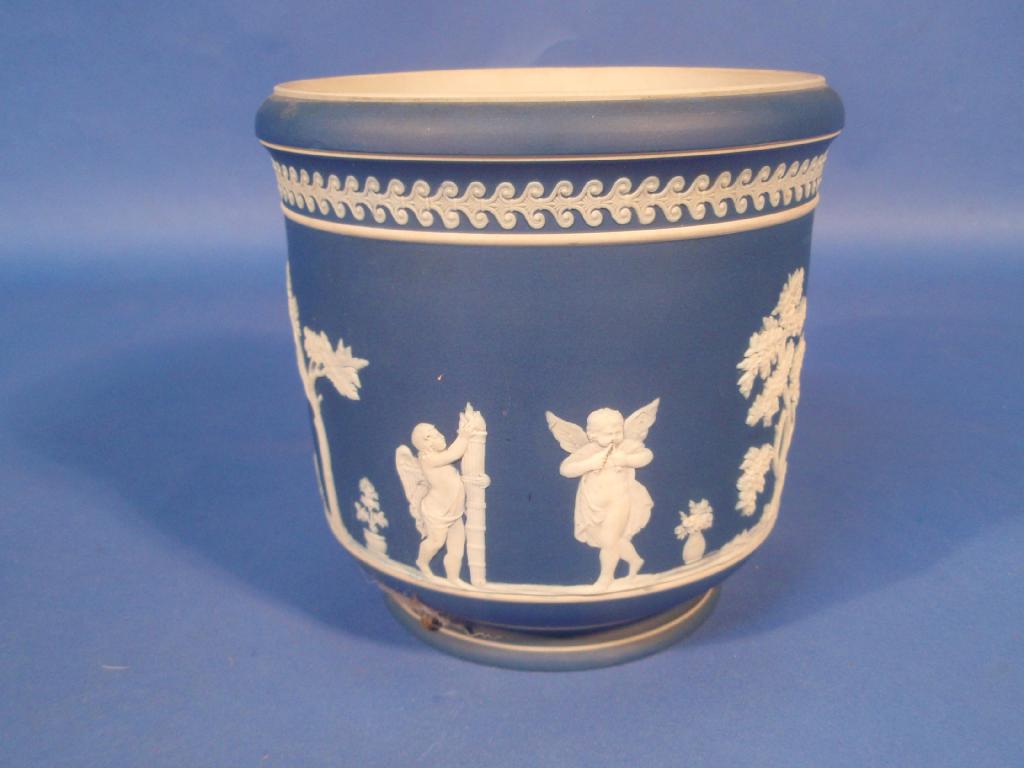 Appraisal: A Jasperware jardiniere having neo classical figures in relief high