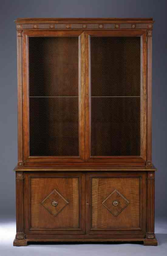 Appraisal: NEOCLASSICAL STYLE WALNUT STEP-BACK BOOKCASE CABINET Upper section molded crest