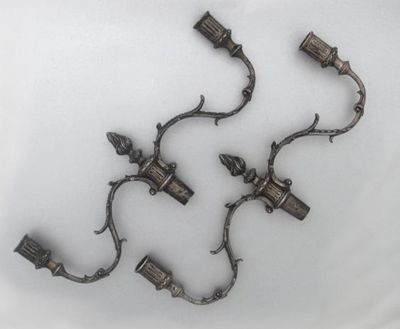 Appraisal: A pair of George III cast twin-light candelabra branches with