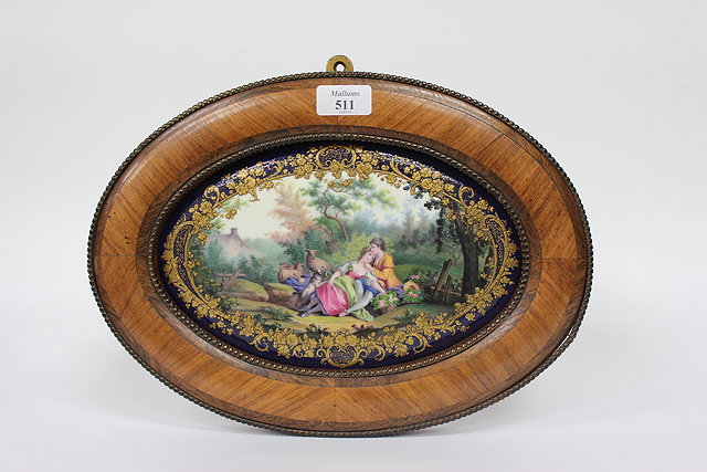 Appraisal: AN ANTIQUE FRENCH OVAL PORCELAIN PLAQUE COBALT BLUE AND GILDED