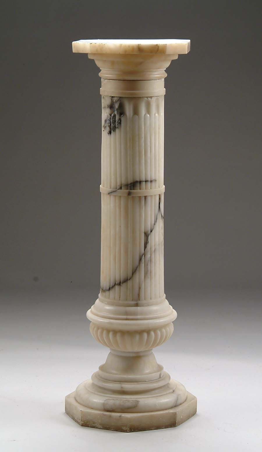 Appraisal: MARBLE PEDESTAL Very impressive marble pedestal has octagon base leading