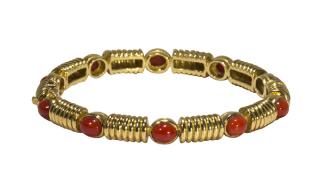 Appraisal: Tiffany and Co red coral and k yellow gold bangle