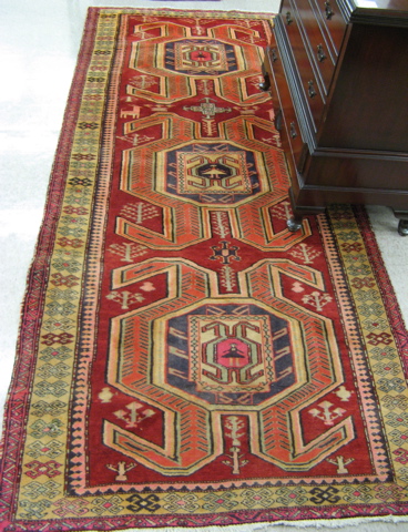 Appraisal: PERSIAN MISHKINSHAHR AREA RUG Azerbaijan Province northwestern Iran three geometric