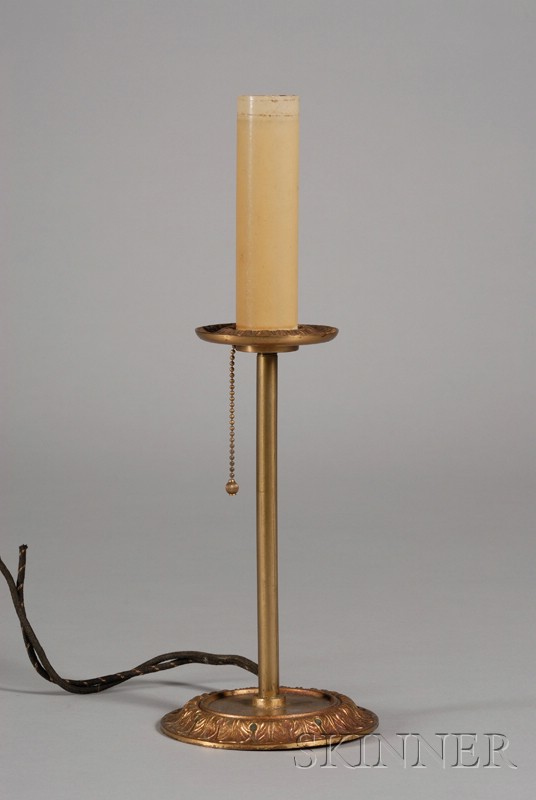 Appraisal: L C Tiffany Furnaces Gilt-bronze Candlestick Lamp with original painted