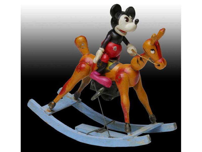 Appraisal: Walt Disney Celluloid Mickey Mouse on Wood Rocking Description ''