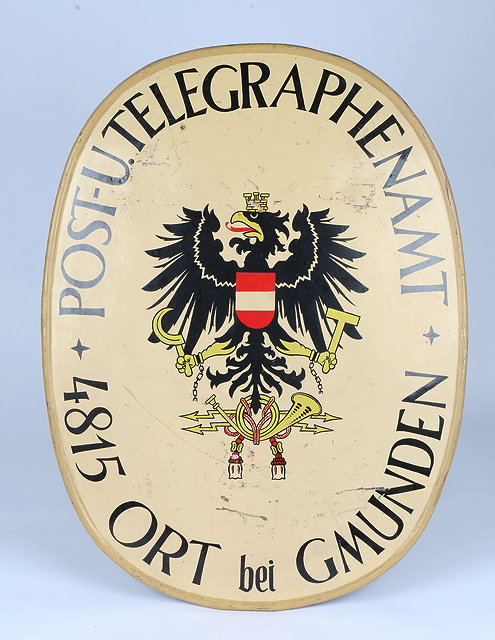 Appraisal: A GERMAN PAINTED OVAL TIN POST AND TELEGRAPH OFFICE SIGN