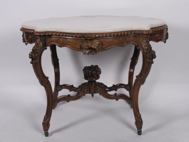 Appraisal: Victorian Renaissance Revival console table with onyx top and basket