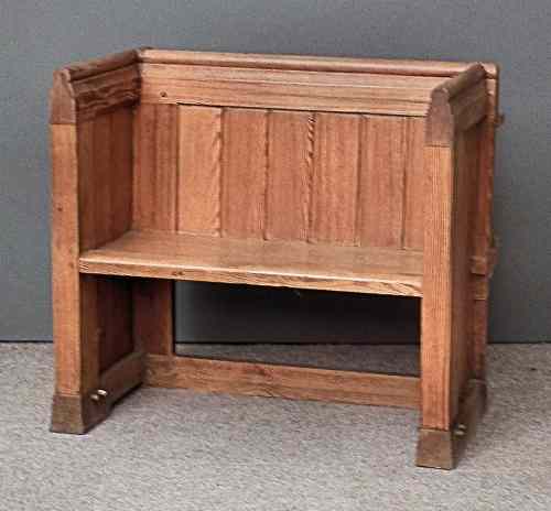 Appraisal: A Victorian stripped pitch pine pew with panelled back ins