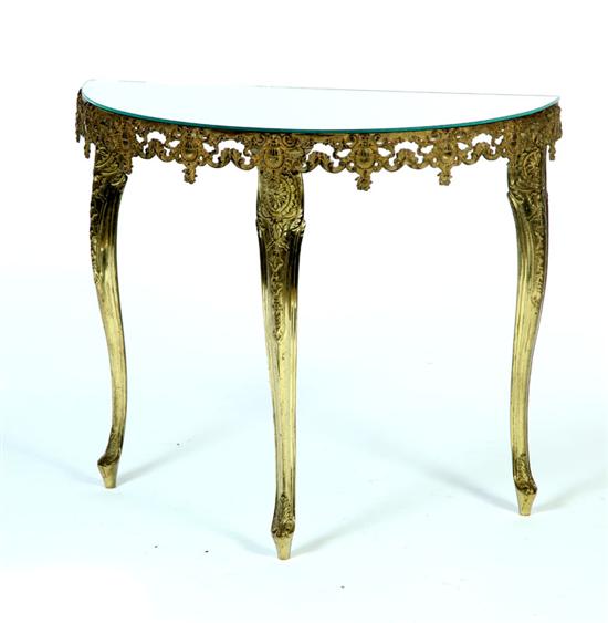 Appraisal: DEMILUNE TABLE Mid th century Polished brass and iron with