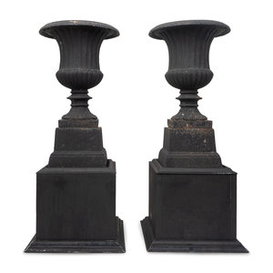 Appraisal: A Pair of Neoclassical Style Black-Painted Cast-Iron Urns Height overall