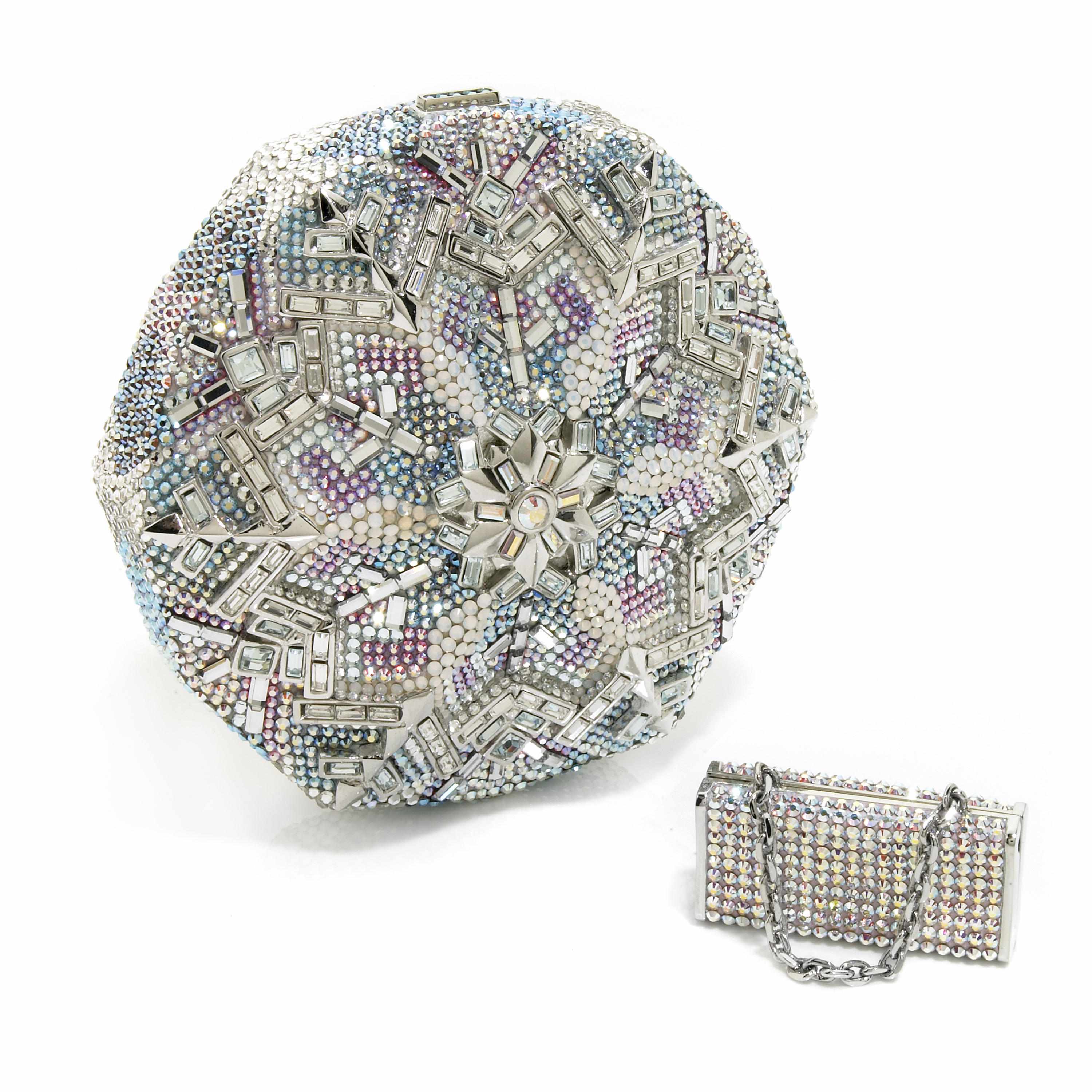 Appraisal: A silver and multi-colored crystal snowflake minaudiere together with an